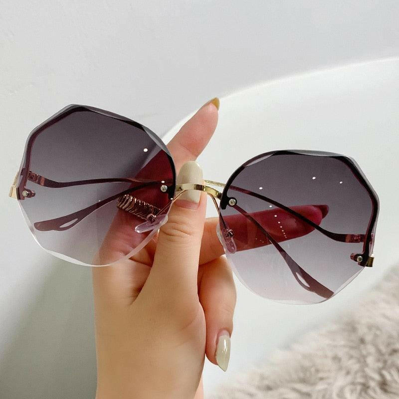 Curved Rimless Sun Glasses 