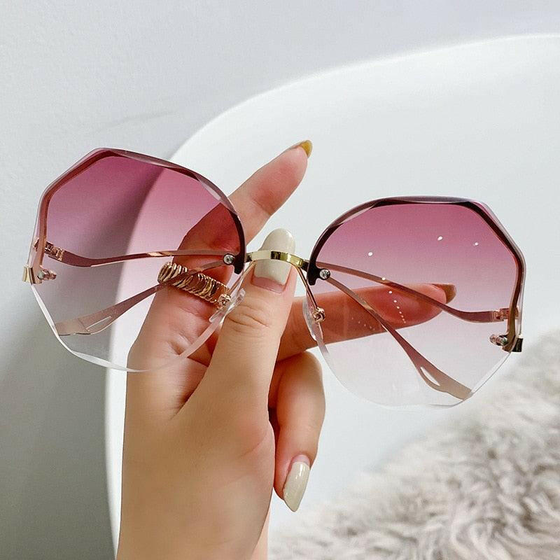 Curved Rimless Sun Glasses 